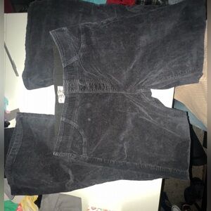 Black corduroy bell bottom Free People pants sz 32 mid to low rise.